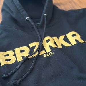 BRZRKR Black Hoodie with Gold Logo